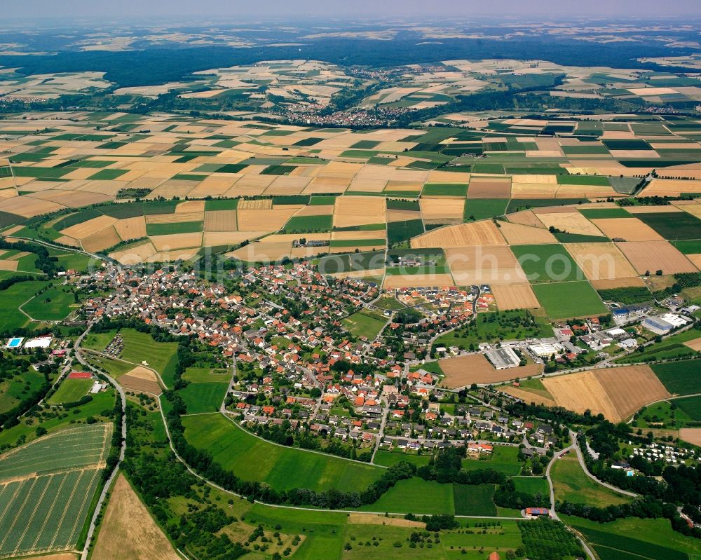 Aerial image Langenbeutingen - Village view on the edge of agricultural fields and land in Langenbeutingen in the state Baden-Wuerttemberg, Germany