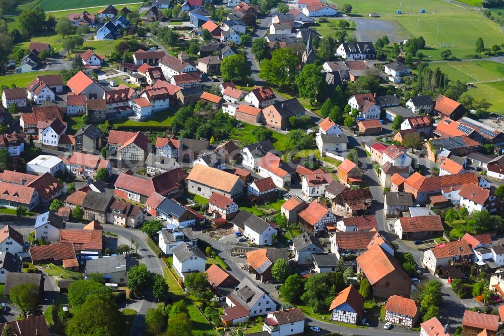 Langenschwarz from above - Village view on the edge of agricultural fields and land in Langenschwarz in the state Hesse, Germany