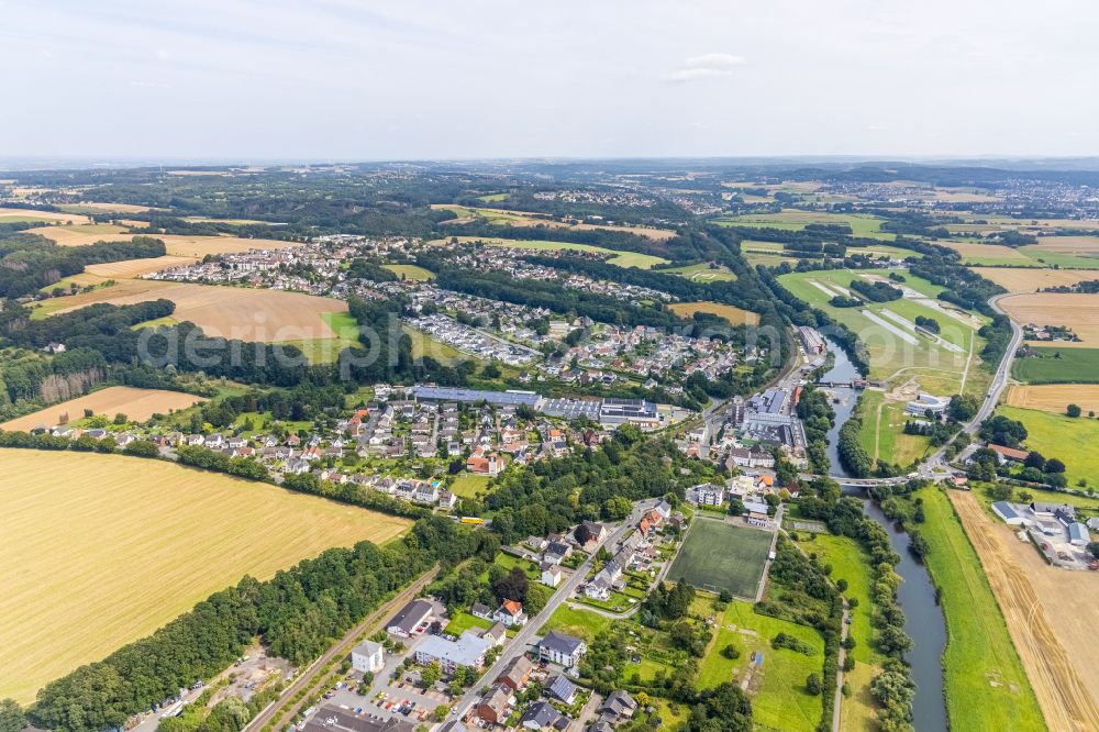 Langschede from the bird's eye view: Village view on the edge of agricultural fields and land in Langschede in the state North Rhine-Westphalia, Germany