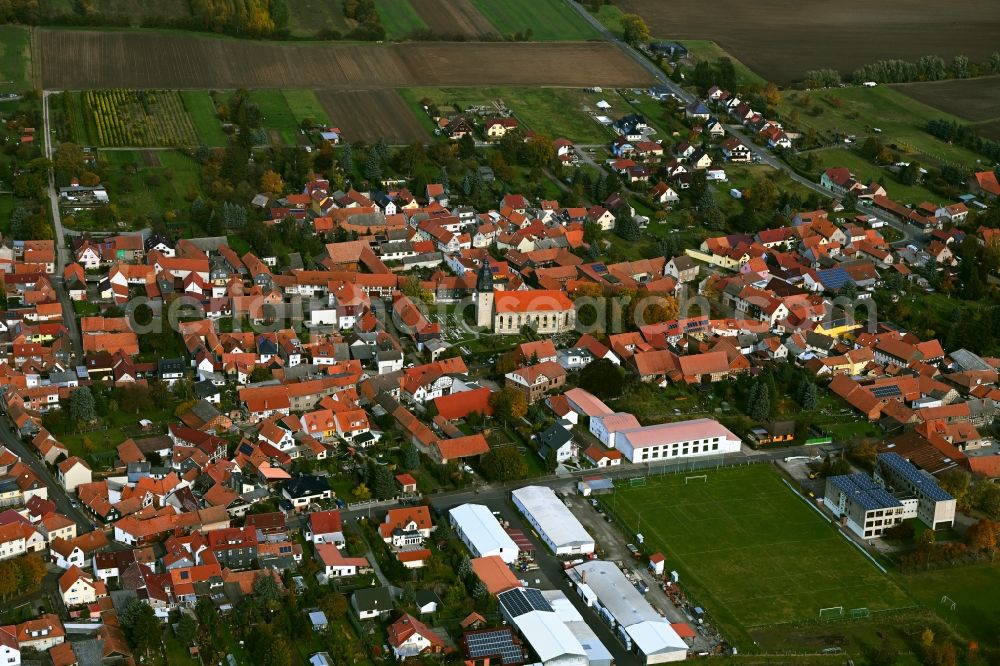 Langula from the bird's eye view: Village view on the edge of agricultural fields and land in Langula in the state Thuringia, Germany