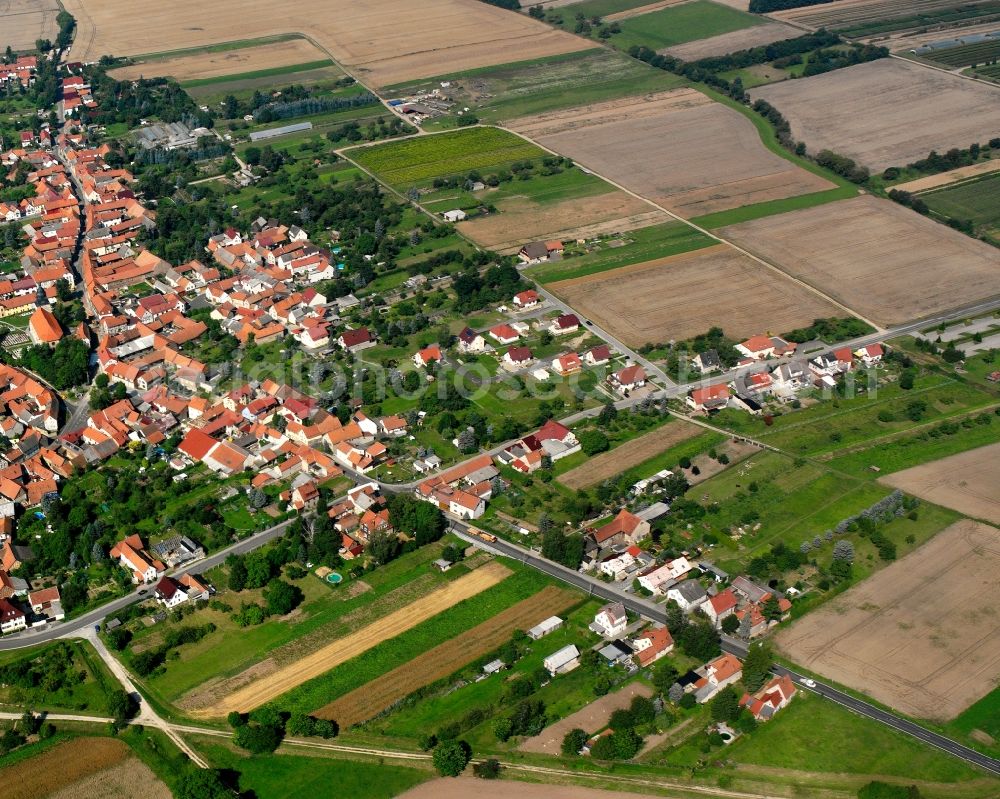 Langula from the bird's eye view: Village view on the edge of agricultural fields and land in Langula in the state Thuringia, Germany