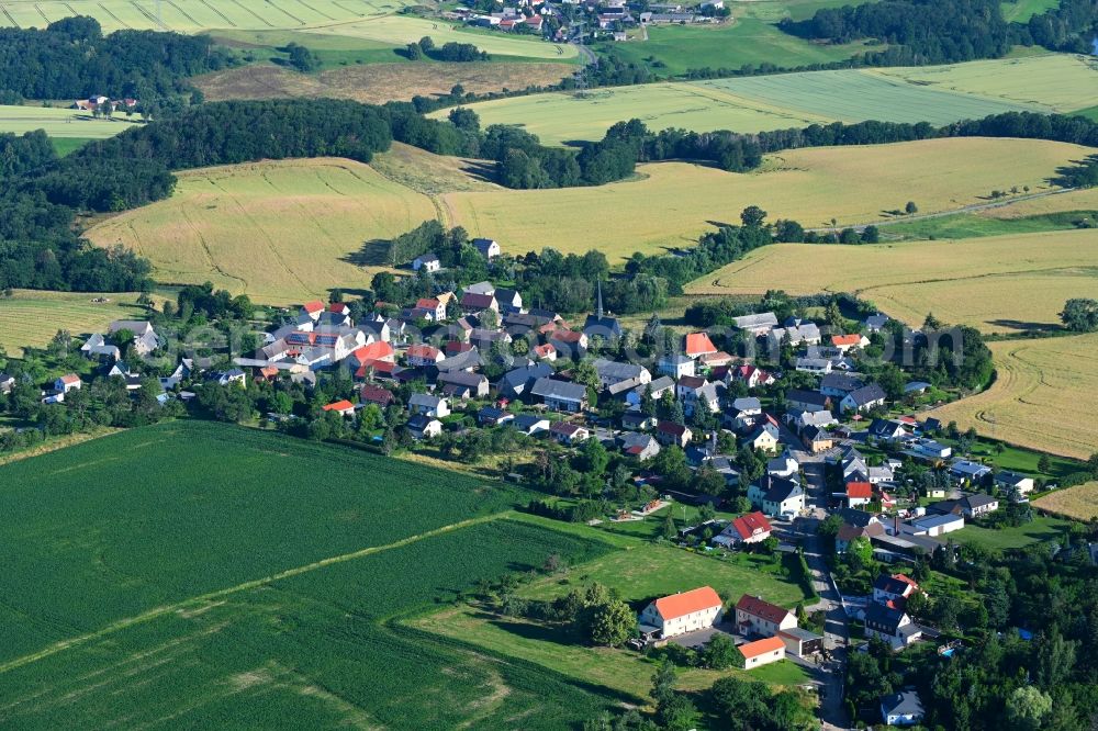 Lastau from the bird's eye view: Village view on the edge of agricultural fields and land in Lastau in the state Saxony, Germany