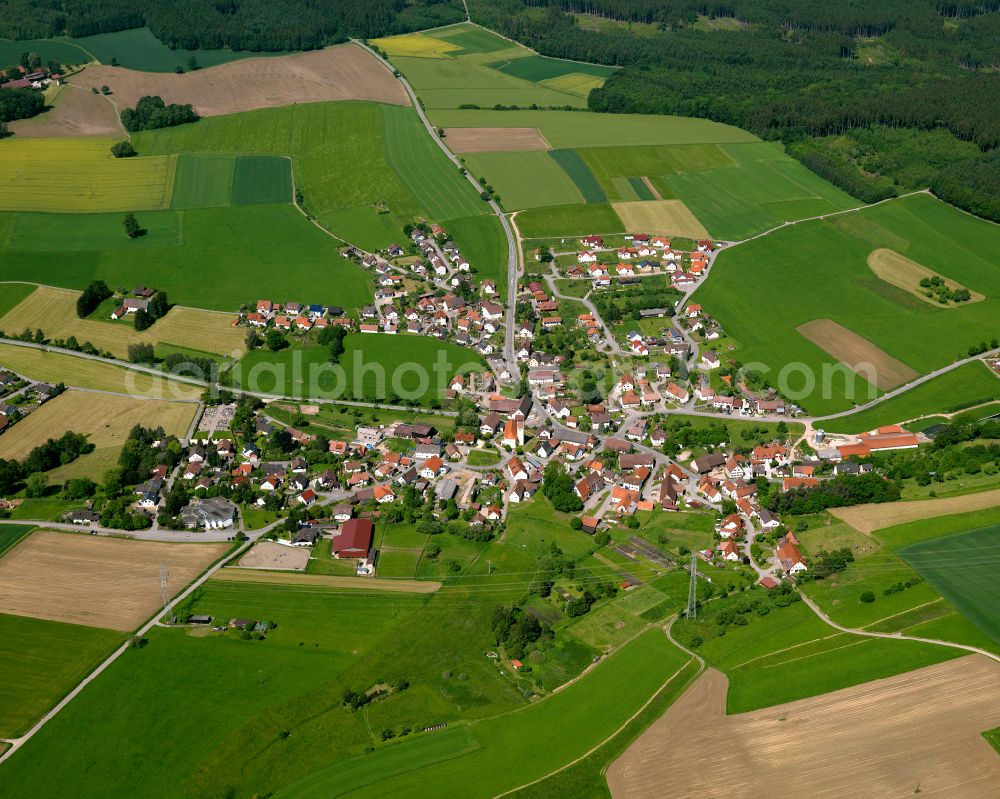 Laupertshausen from above - Village view on the edge of agricultural fields and land in Laupertshausen in the state Baden-Wuerttemberg, Germany