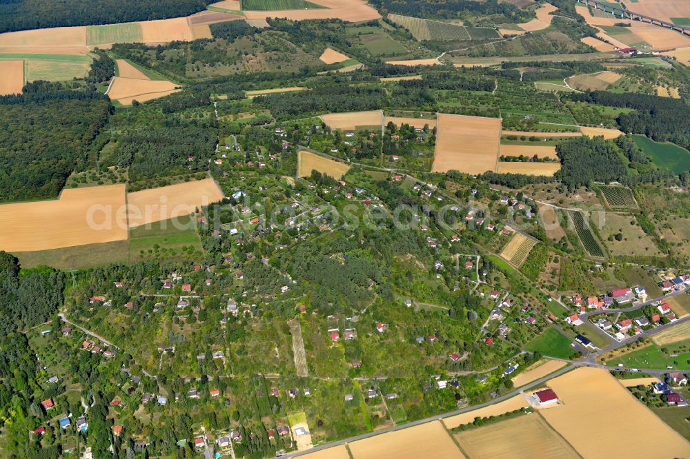 Aerial image Leinach - Village view on the edge of agricultural fields and land in Leinach in the state Bavaria, Germany