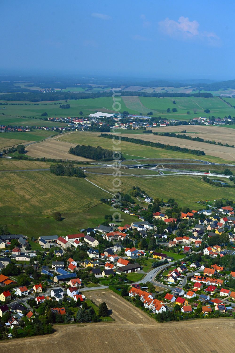 Leppersdorf from above - Village view on the edge of agricultural fields and land on street S95 in Leppersdorf in the state Saxony, Germany