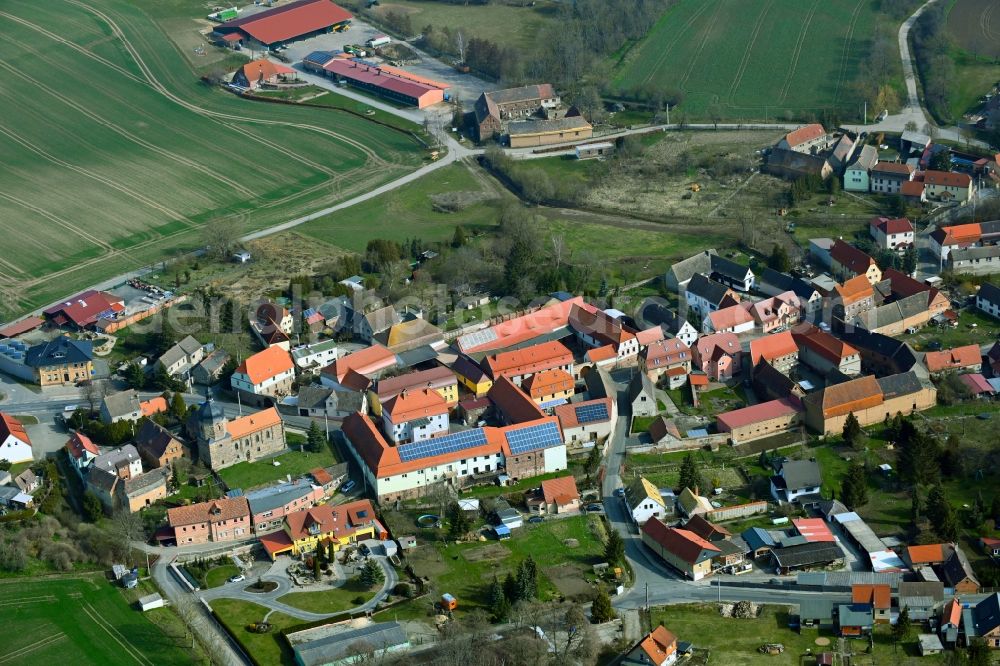 Liederstädt from the bird's eye view: Village view on the edge of agricultural fields and land in Liederstaedt in the state Saxony-Anhalt, Germany