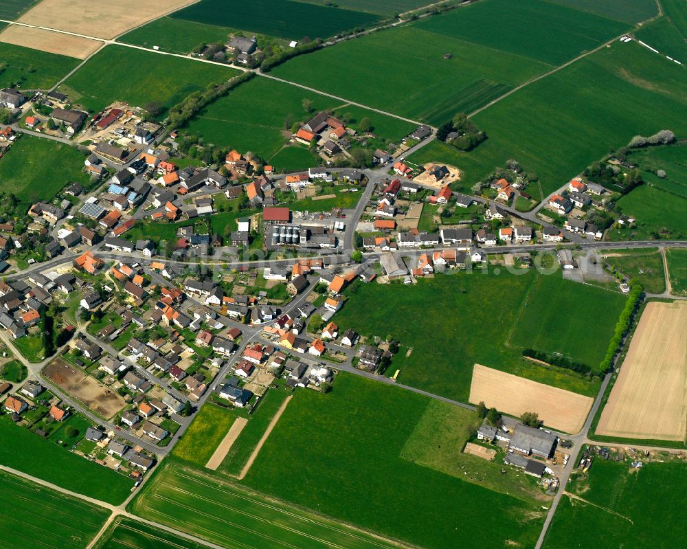 Lingelbach from the bird's eye view: Village view on the edge of agricultural fields and land in Lingelbach in the state Hesse, Germany