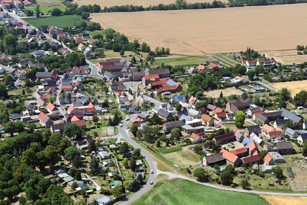 Lunstädt from the bird's eye view: Village view on the edge of agricultural fields and land in Lunstaedt in the state Saxony-Anhalt, Germany