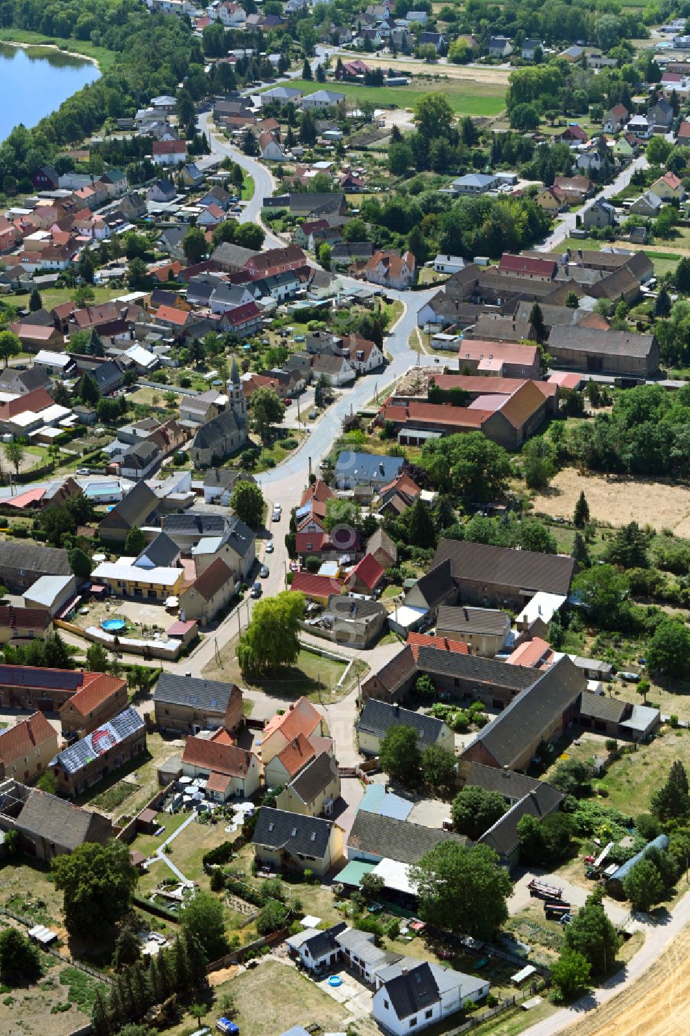 Aerial photograph Lunstädt - Village view on the edge of agricultural fields and land in Lunstaedt in the state Saxony-Anhalt, Germany