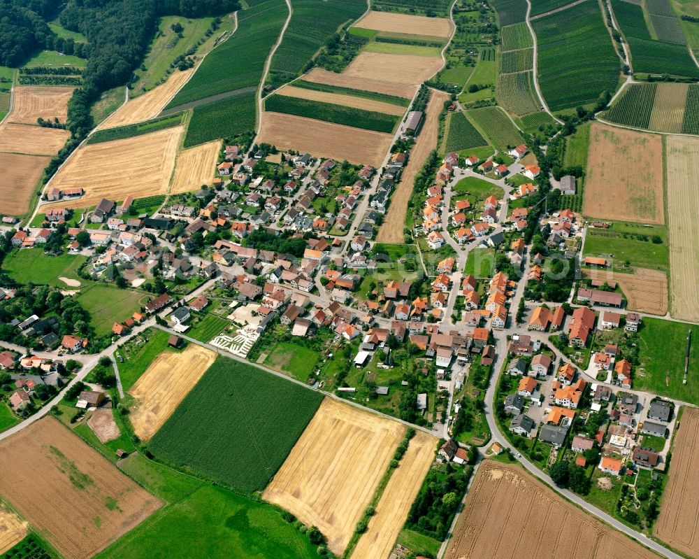 Löwenstein from the bird's eye view: Village view on the edge of agricultural fields and land in Löwenstein in the state Baden-Wuerttemberg, Germany