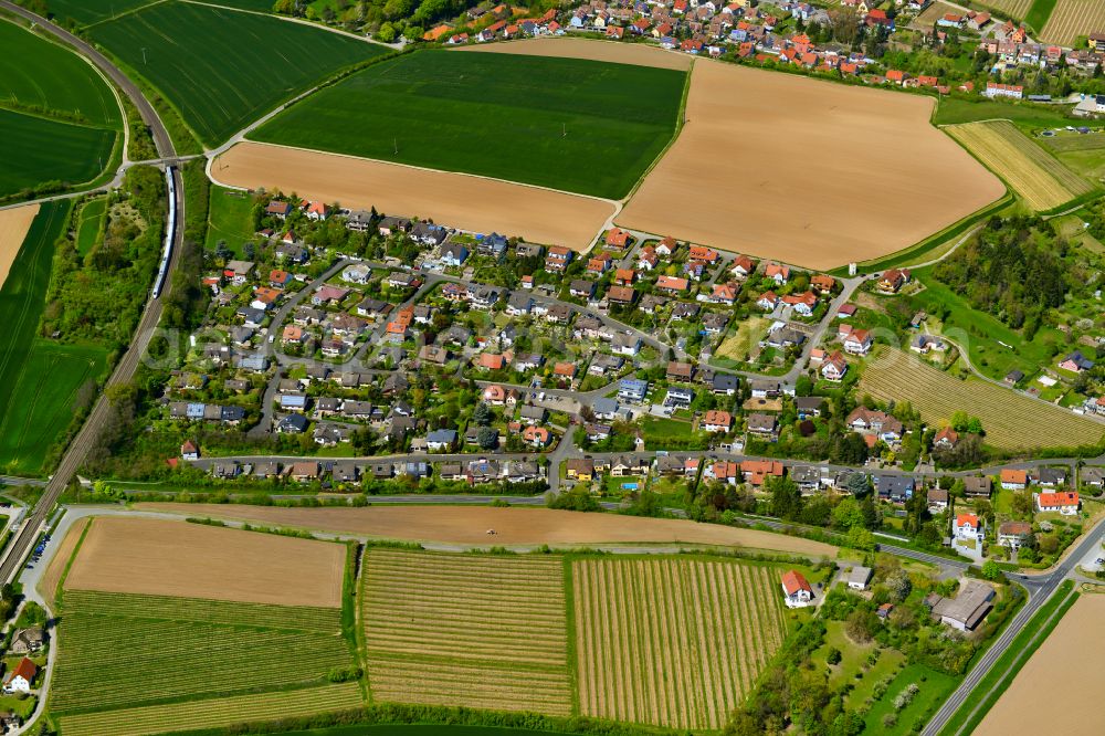 Aerial image Mainstockheim - Village view on the edge of agricultural fields and land in Mainstockheim in the state Bavaria, Germany