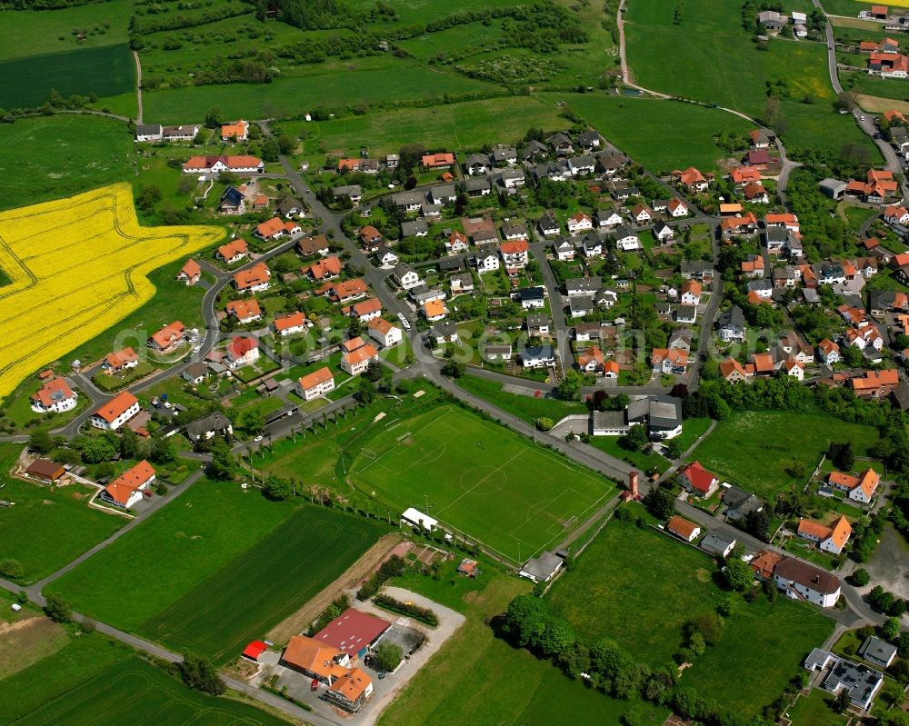 Aerial image Mansbach - Village view on the edge of agricultural fields and land in Mansbach in the state Hesse, Germany