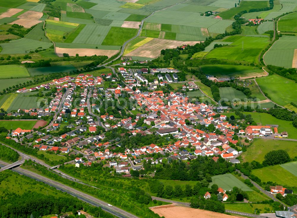 Aerial image Marnheim - Village view on the edge of agricultural fields and land in Marnheim in the state Rhineland-Palatinate, Germany