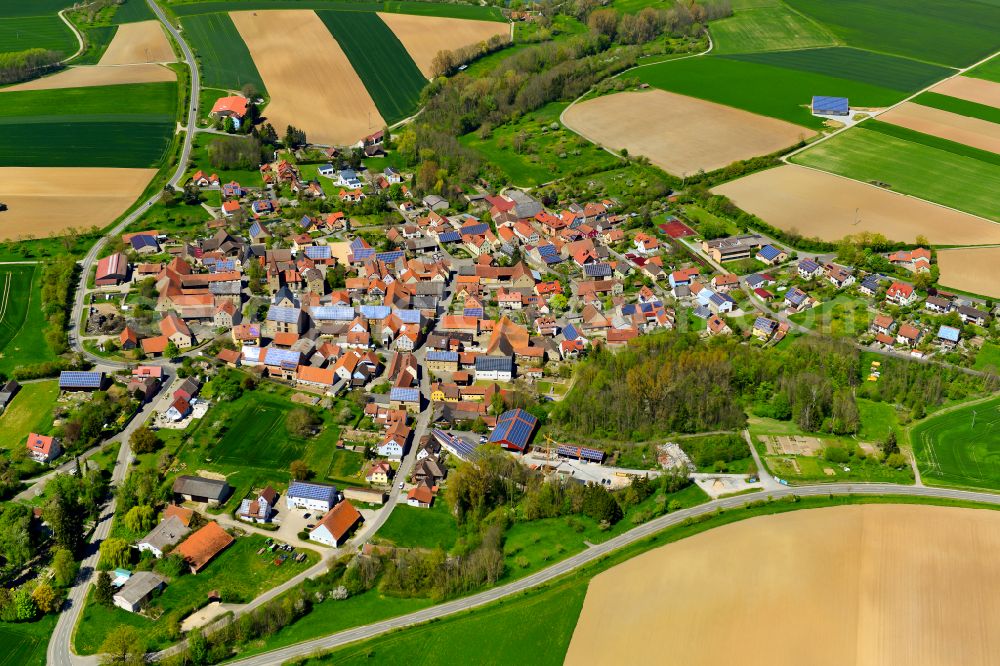 Martinsheim from above - Village view on the edge of agricultural fields and land in Martinsheim in the state Bavaria, Germany