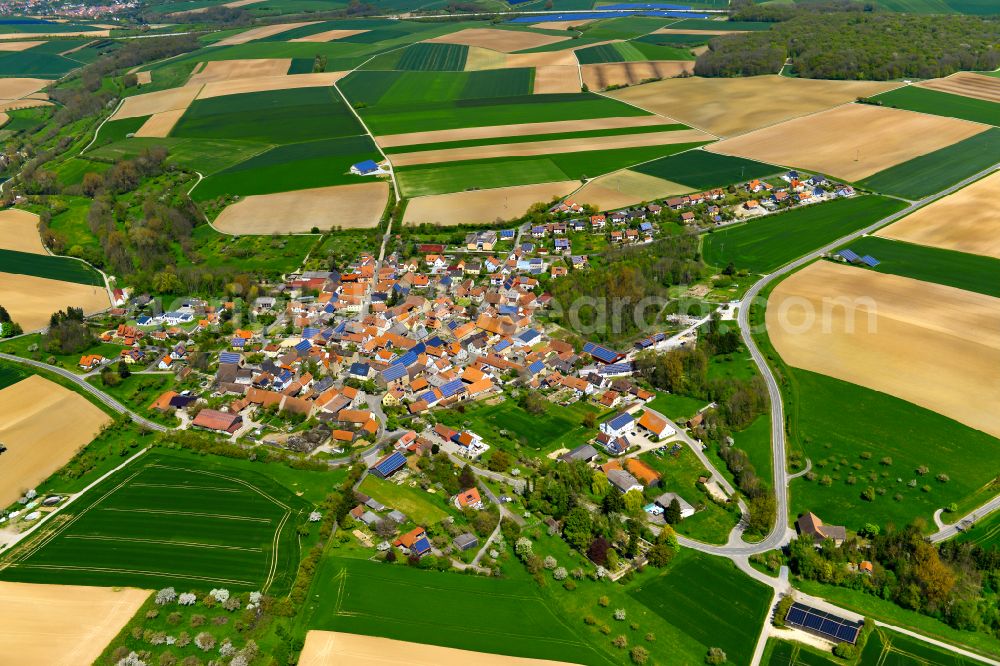 Martinsheim from the bird's eye view: Village view on the edge of agricultural fields and land in Martinsheim in the state Bavaria, Germany