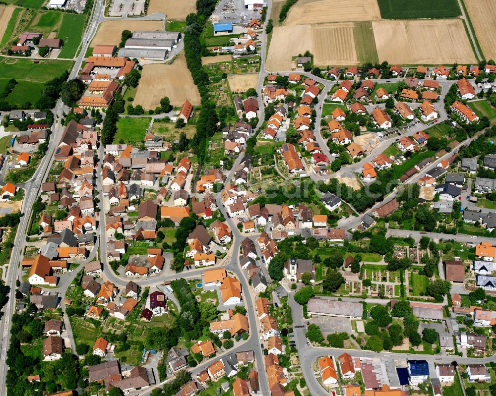 Massenbach from the bird's eye view: Village view on the edge of agricultural fields and land in Massenbach in the state Baden-Wuerttemberg, Germany