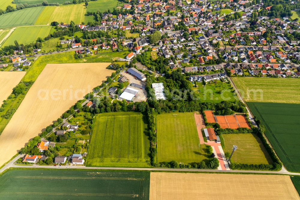 Aerial image Meiningsen - Village view on the edge of agricultural fields and land in Meiningsen in the state North Rhine-Westphalia, Germany