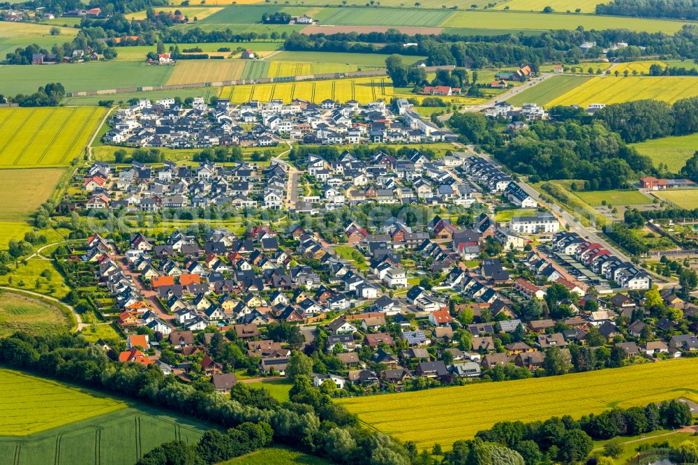 Meiningsen from above - Village view on the edge of agricultural fields and land in Meiningsen in the state North Rhine-Westphalia, Germany