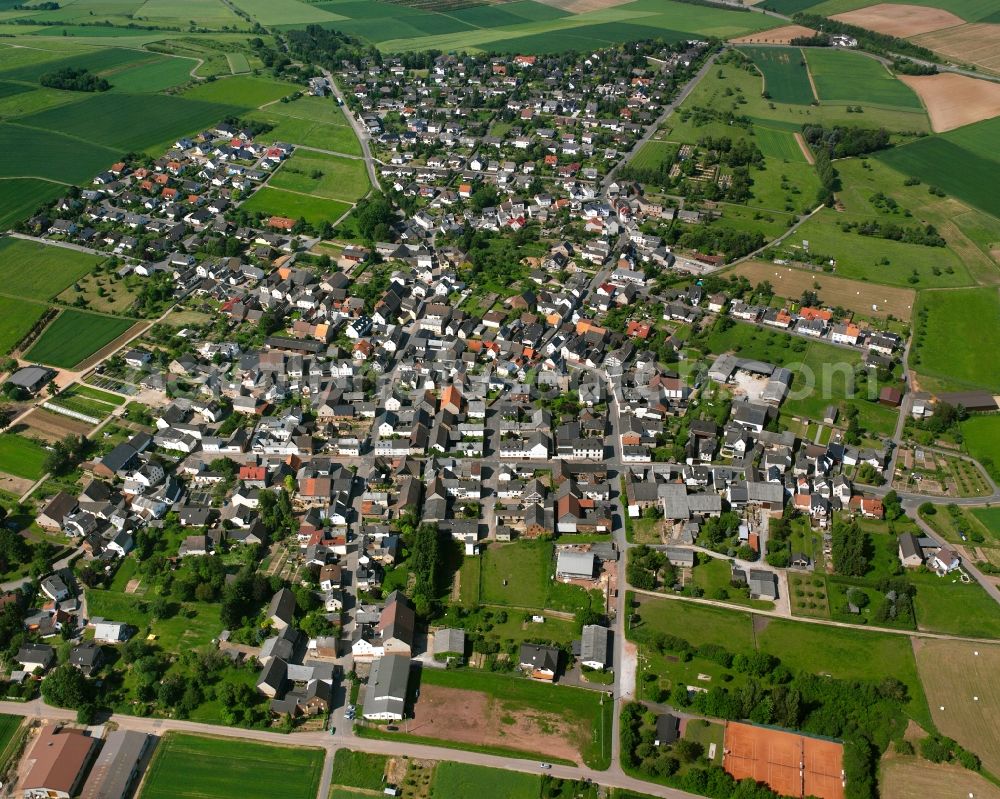 Aerial image Mensfelden - Village view on the edge of agricultural fields and land in Mensfelden in the state Hesse, Germany