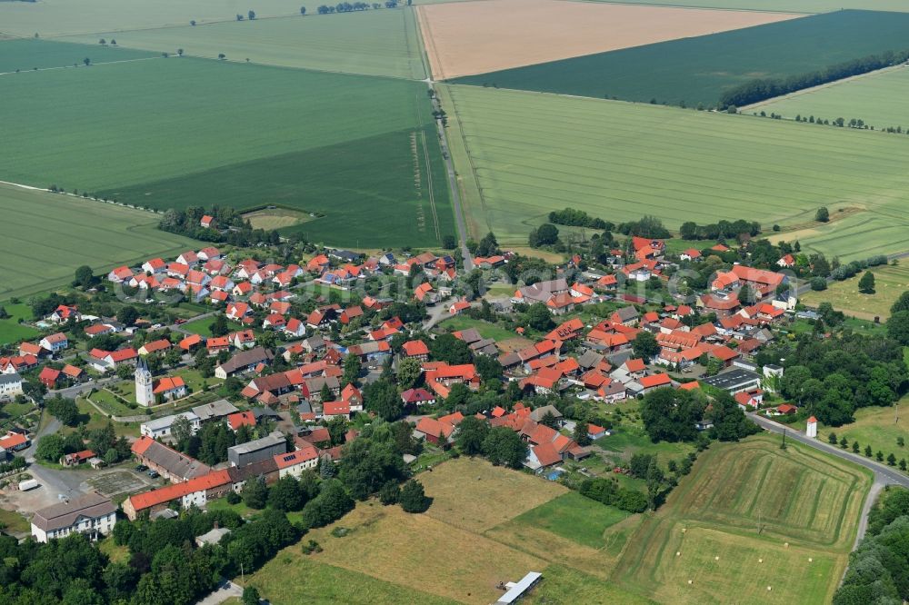 Aerial image Minsleben - Village view on the edge of agricultural fields and land in Minsleben in the state Saxony-Anhalt, Germany