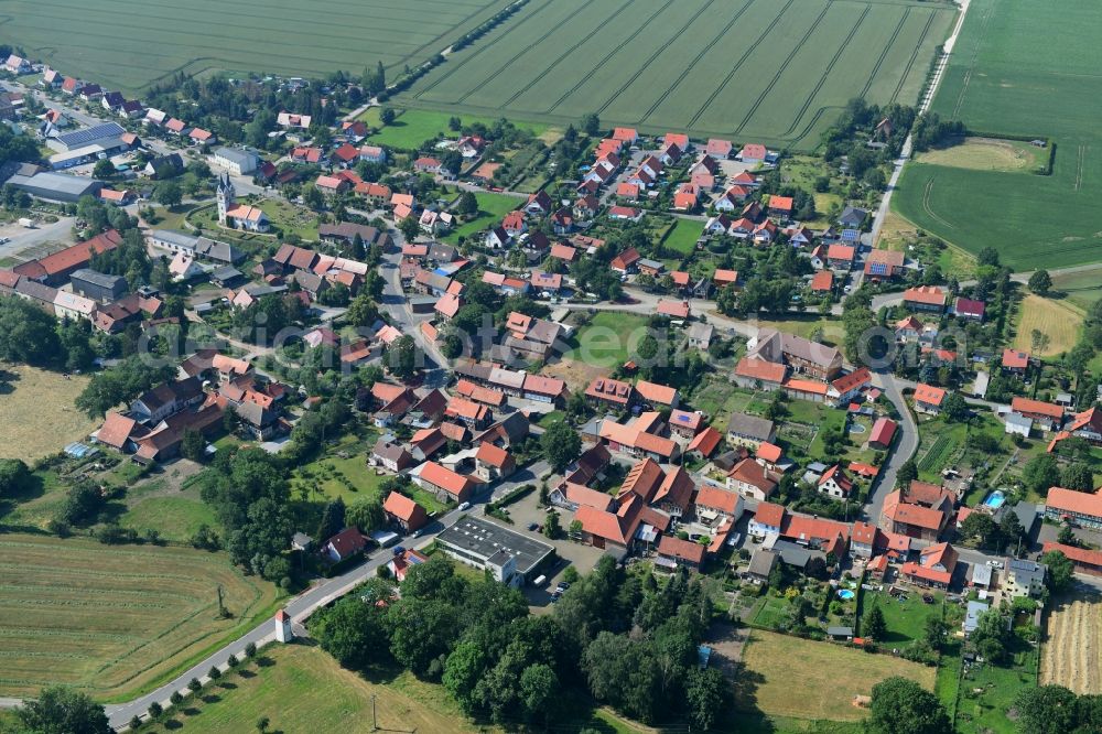 Minsleben from above - Village view on the edge of agricultural fields and land in Minsleben in the state Saxony-Anhalt, Germany