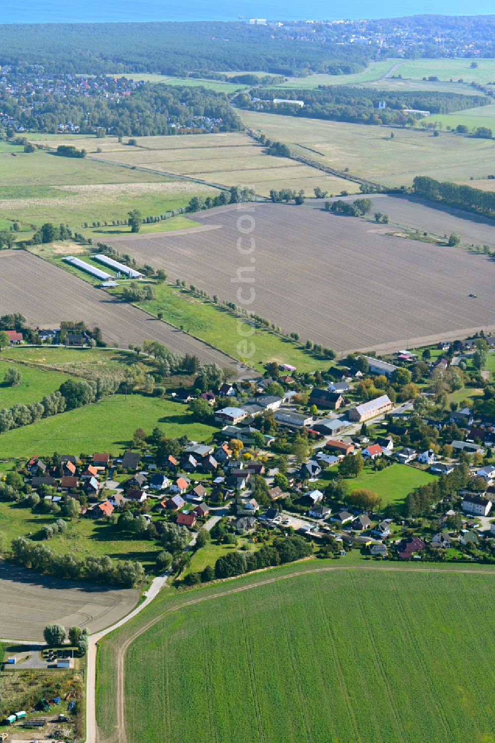 Mölschow from above - Village view on the edge of agricultural fields and land in Moelschow in the state Mecklenburg - Western Pomerania, Germany