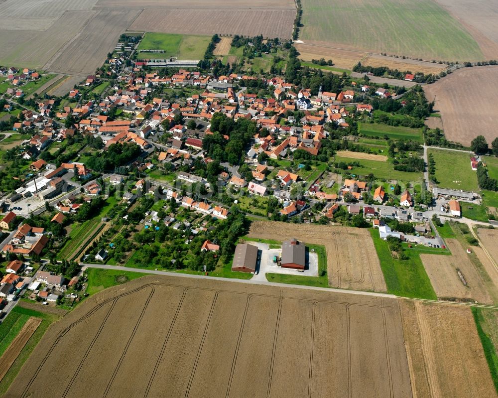 Mülverstedt from the bird's eye view: Village view on the edge of agricultural fields and land in Mülverstedt in the state Thuringia, Germany