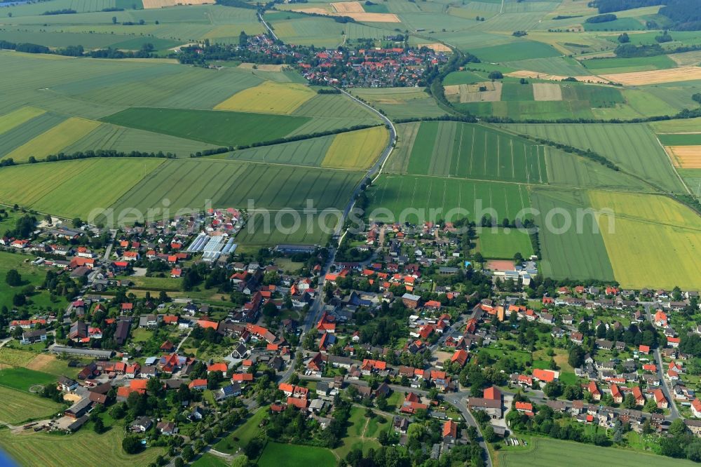 Aerial image Münchehof - Village view on the edge of agricultural fields and land in Muenchehof in the state Lower Saxony, Germany