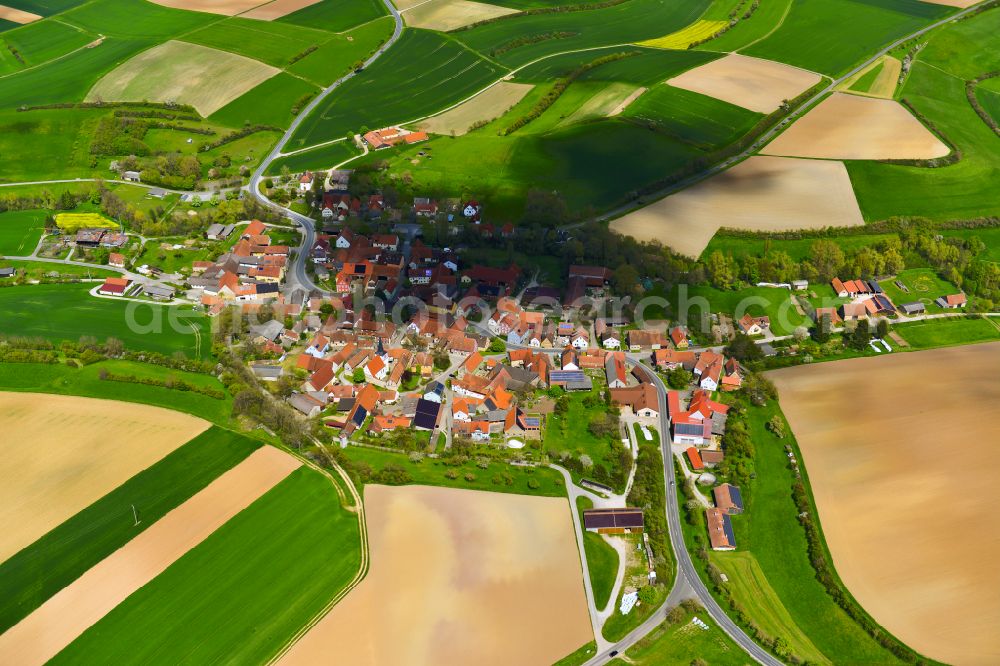 Mönchsondheim from the bird's eye view: Village view on the edge of agricultural fields and land in Mönchsondheim in the state Bavaria, Germany