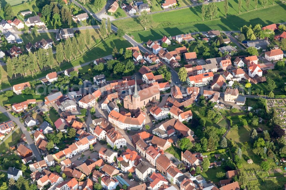 Mudau from above - Village view on the edge of agricultural fields and land in Mudau in the state Baden-Wurttemberg, Germany