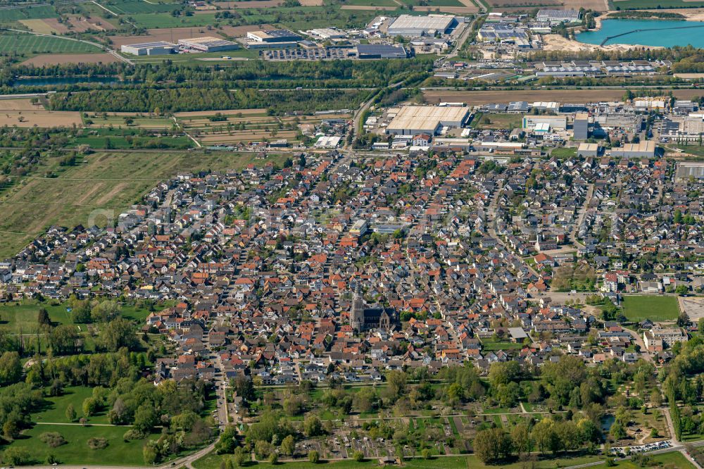 Aerial image Muggensturm - Village view on the edge of agricultural fields and land in Muggensturm in the state Baden-Wuerttemberg, Germany