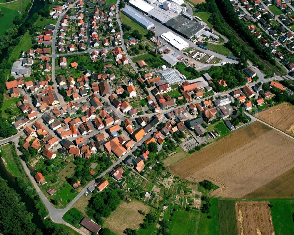 Neudenau from above - Village view on the edge of agricultural fields and land in Neudenau in the state Baden-Wuerttemberg, Germany