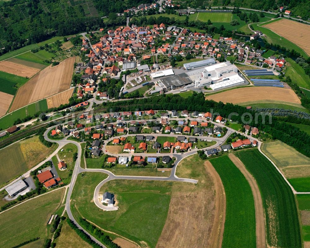 Neudenau from the bird's eye view: Village view on the edge of agricultural fields and land in Neudenau in the state Baden-Wuerttemberg, Germany