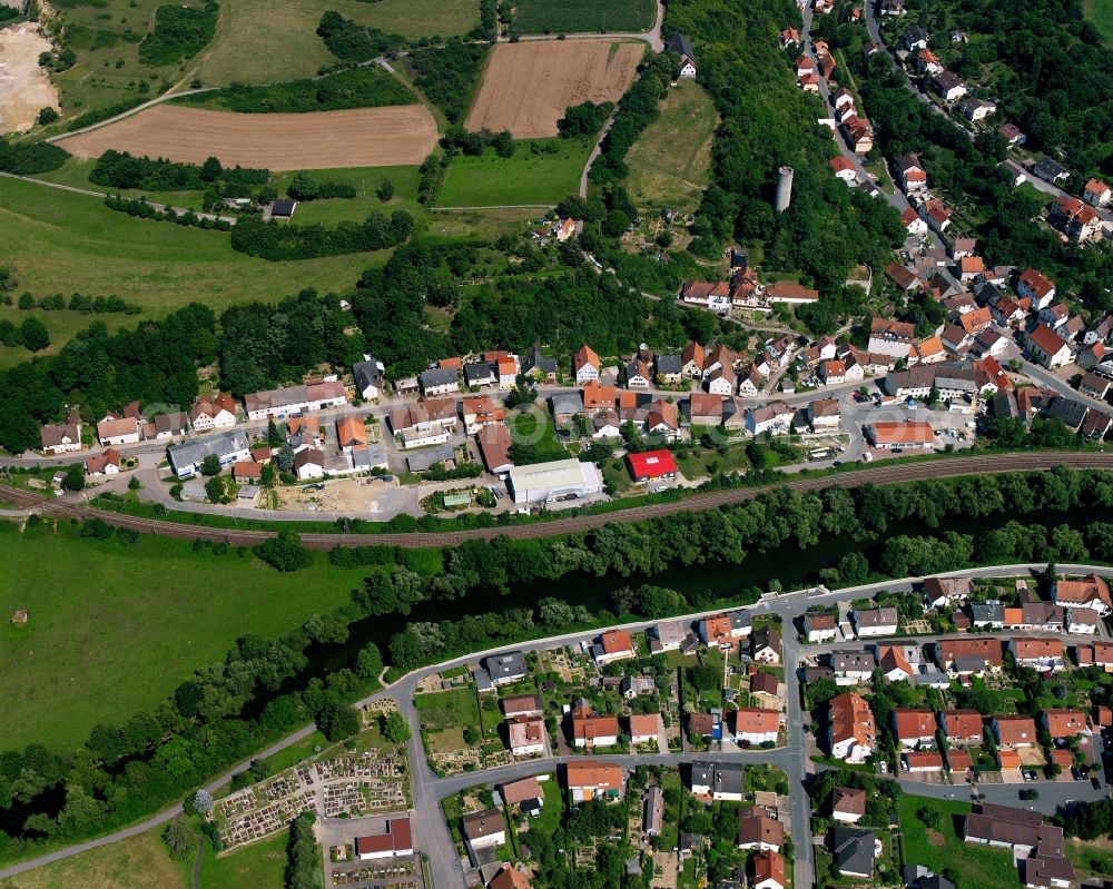 Neudenau from the bird's eye view: Village view on the edge of agricultural fields and land in Neudenau in the state Baden-Wuerttemberg, Germany