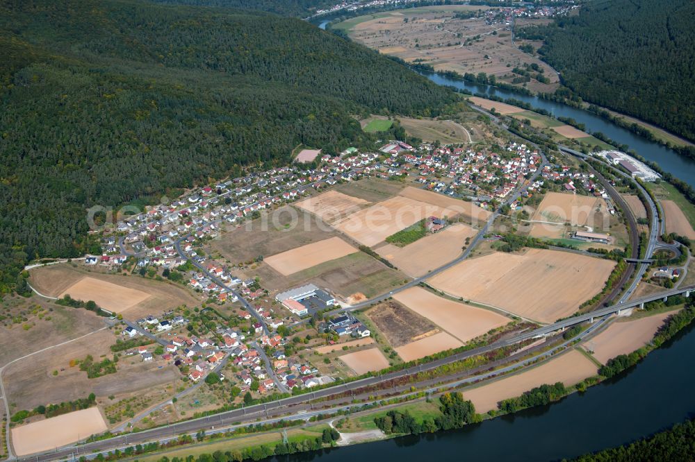 Aerial image Neuendorf - Village view on the edge of agricultural fields and land in Neuendorf in the state Bavaria, Germany