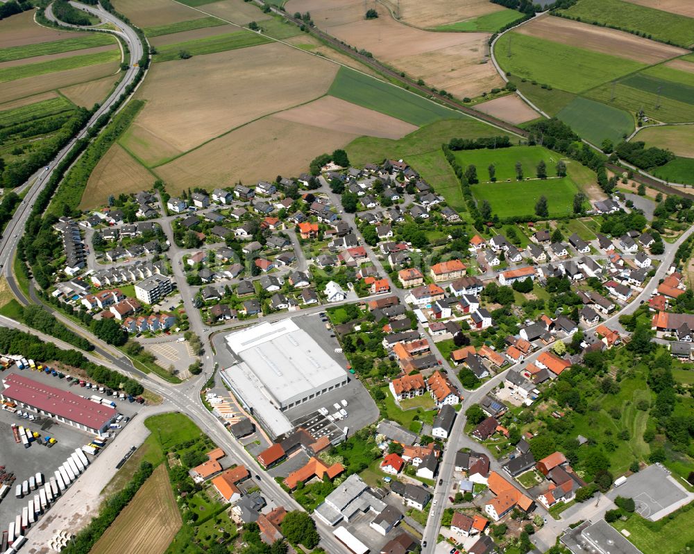 Neumühl from the bird's eye view: Village view on the edge of agricultural fields and land in Neumühl in the state Baden-Wuerttemberg, Germany