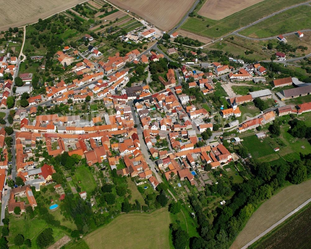 Nägelstedt from above - Village view on the edge of agricultural fields and land in Nägelstedt in the state Thuringia, Germany