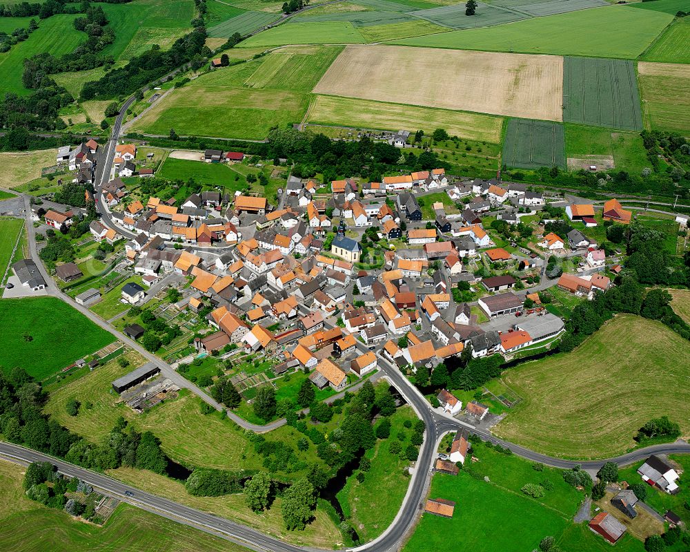 Nieder-Gemünden from above - Village view on the edge of agricultural fields and land in Nieder-Gemünden in the state Hesse, Germany