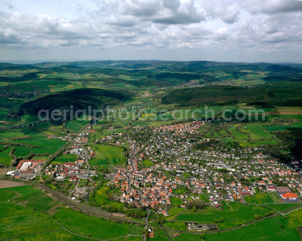 Niederaula from above - Village view on the edge of agricultural fields and land in Niederaula in the state Hesse, Germany