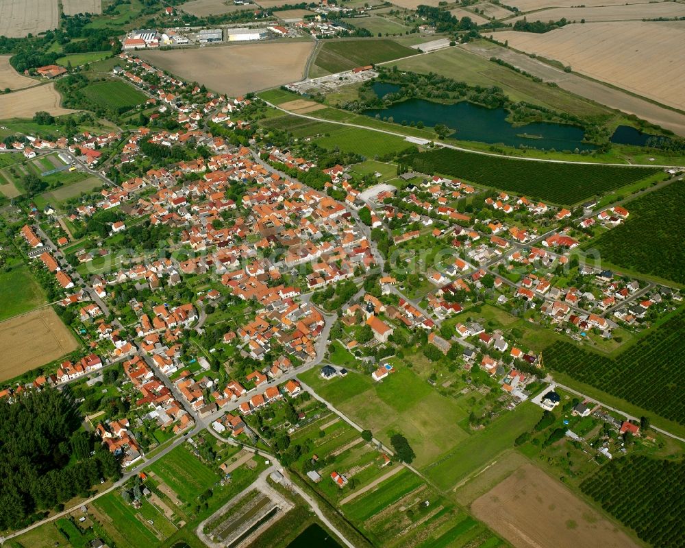 Niederdorla from above - Village view on the edge of agricultural fields and land in Niederdorla in the state Thuringia, Germany