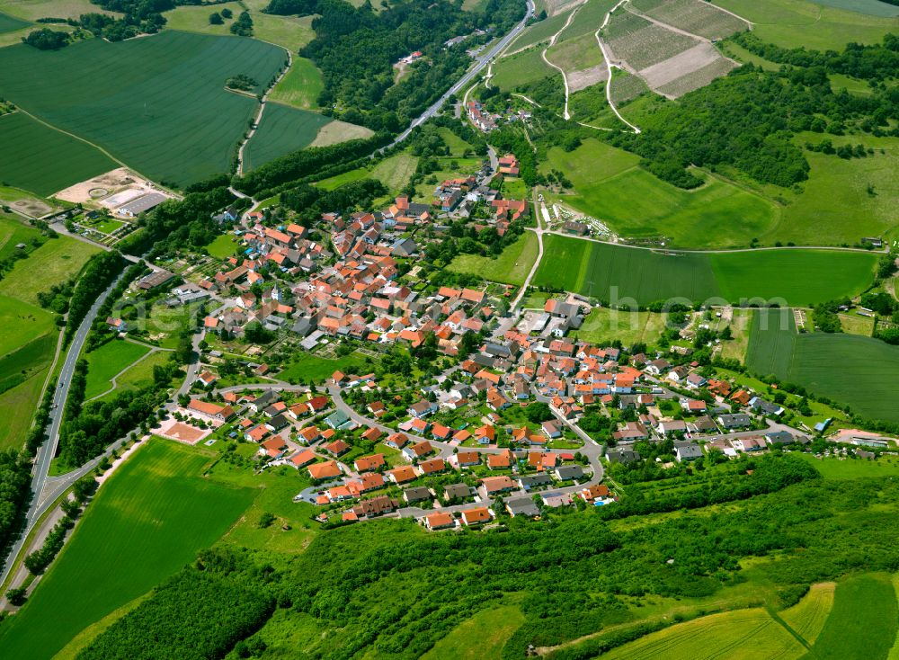 Niedermoschel from above - Village view on the edge of agricultural fields and land in Niedermoschel in the state Rhineland-Palatinate, Germany