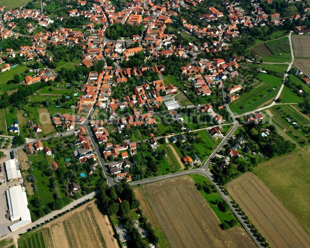 Aerial image Oberdorla - Village view on the edge of agricultural fields and land in Oberdorla in the state Thuringia, Germany