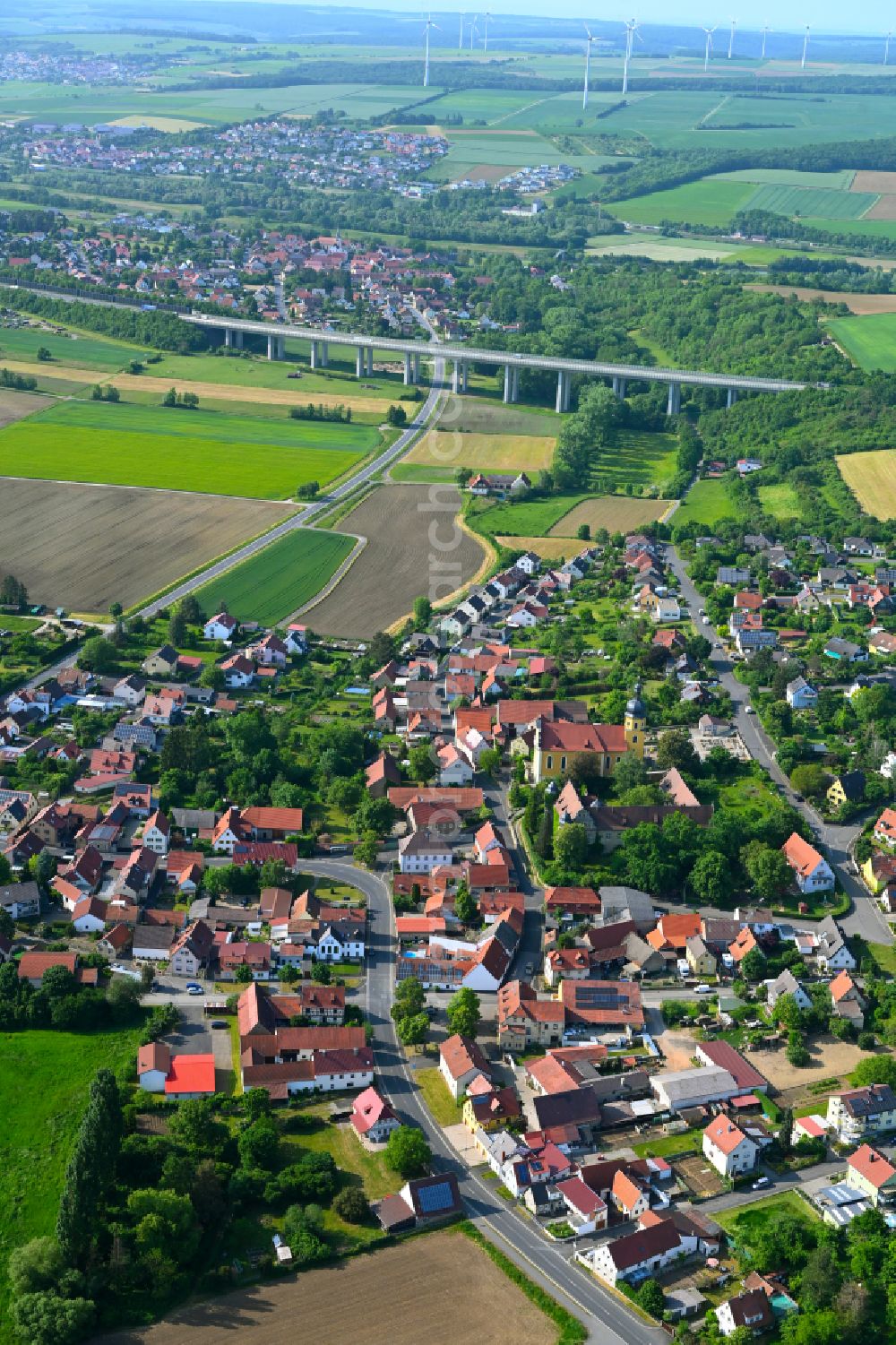 Obereuerheim from above - Village view on the edge of agricultural fields and land in Obereuerheim in the state Bavaria, Germany