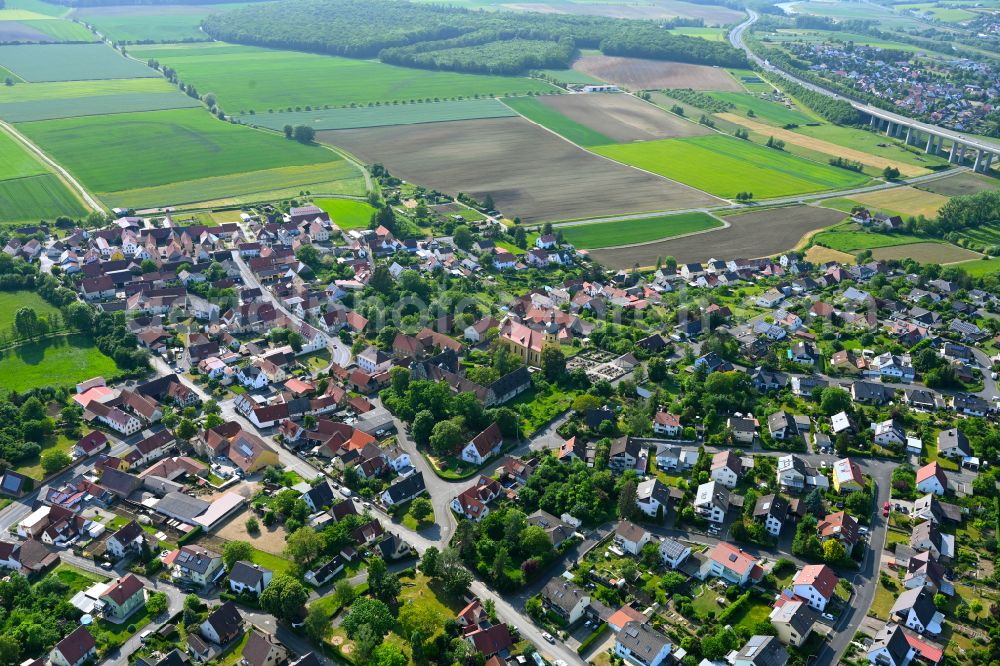 Obereuerheim from the bird's eye view: Village view on the edge of agricultural fields and land in Obereuerheim in the state Bavaria, Germany