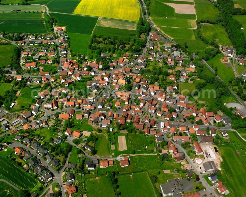 Aerial image Obergeis - Village view on the edge of agricultural fields and land in Obergeis in the state Hesse, Germany