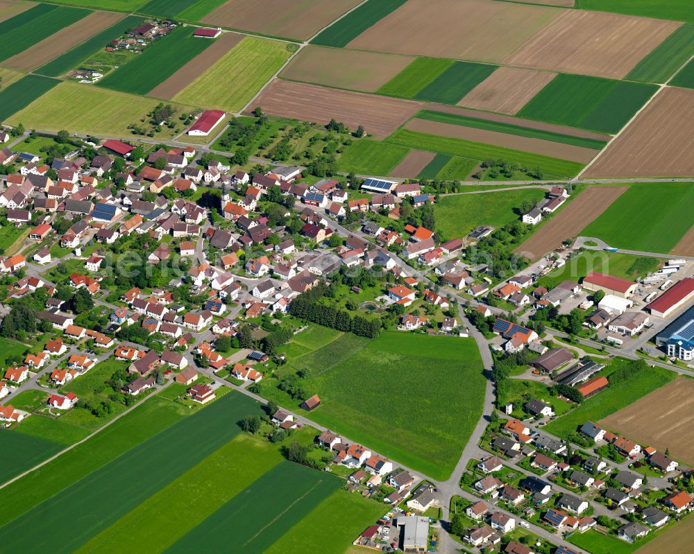 Oberholzheim from above - Village view on the edge of agricultural fields and land in Oberholzheim in the state Baden-Wuerttemberg, Germany