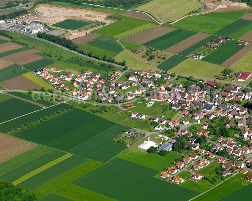 Oberholzheim from the bird's eye view: Village view on the edge of agricultural fields and land in Oberholzheim in the state Baden-Wuerttemberg, Germany