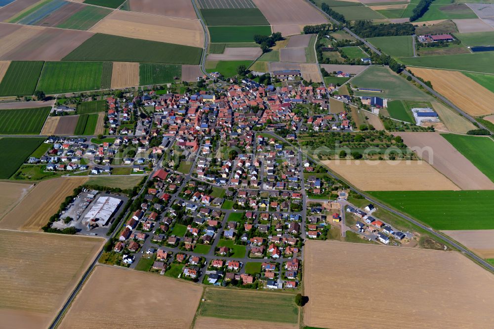 Aerial image Oberpleichfeld - Village view on the edge of agricultural fields and land in Oberpleichfeld in the state Bavaria, Germany