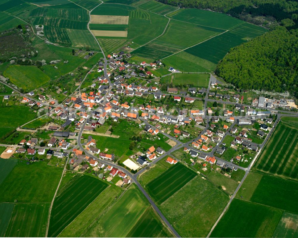 Ohmes from the bird's eye view: Village view on the edge of agricultural fields and land in Ohmes in the state Hesse, Germany