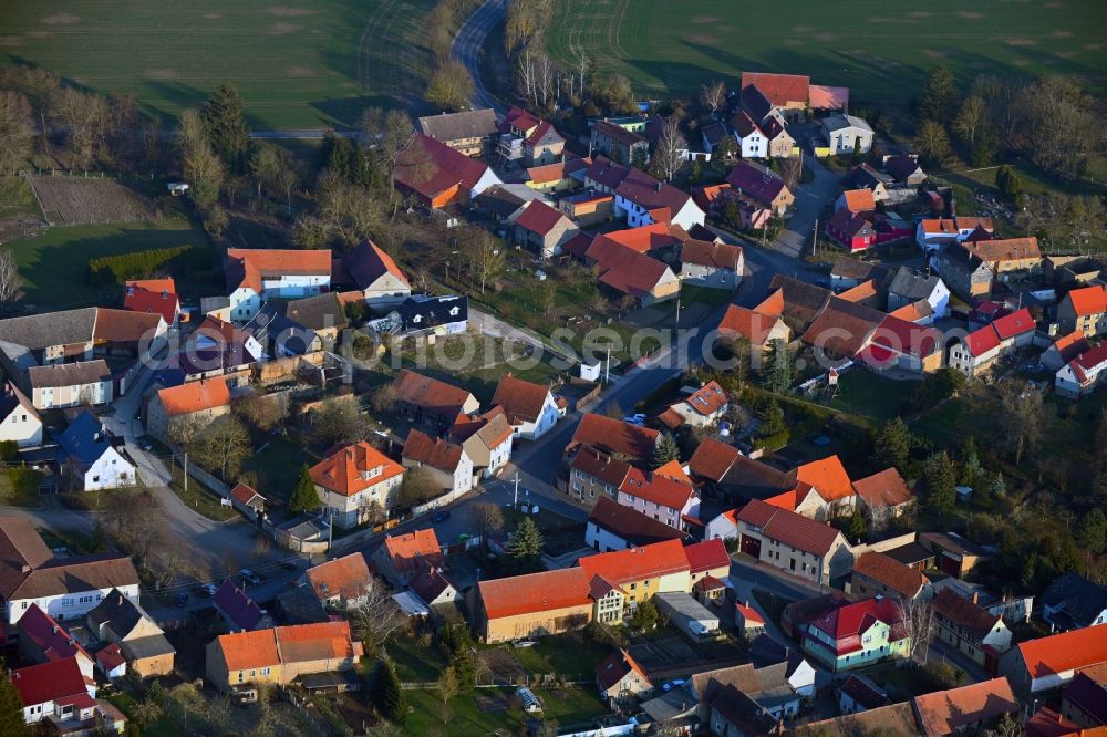 Aerial image Ostramondra - Village view on the edge of agricultural fields and land in Ostramondra in the state Thuringia, Germany